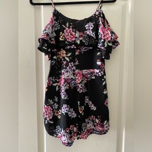 Romper from a boutique in south Florida.